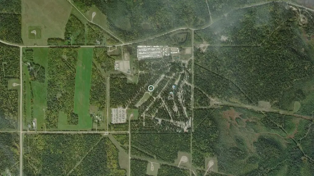 Aerial view of Wilderness Village RV Resort and surroundings