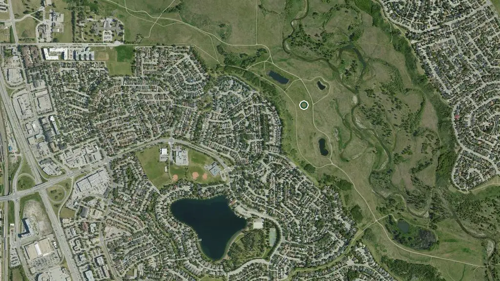 Aerial view of Fish Creek Provincial Park and surroundings