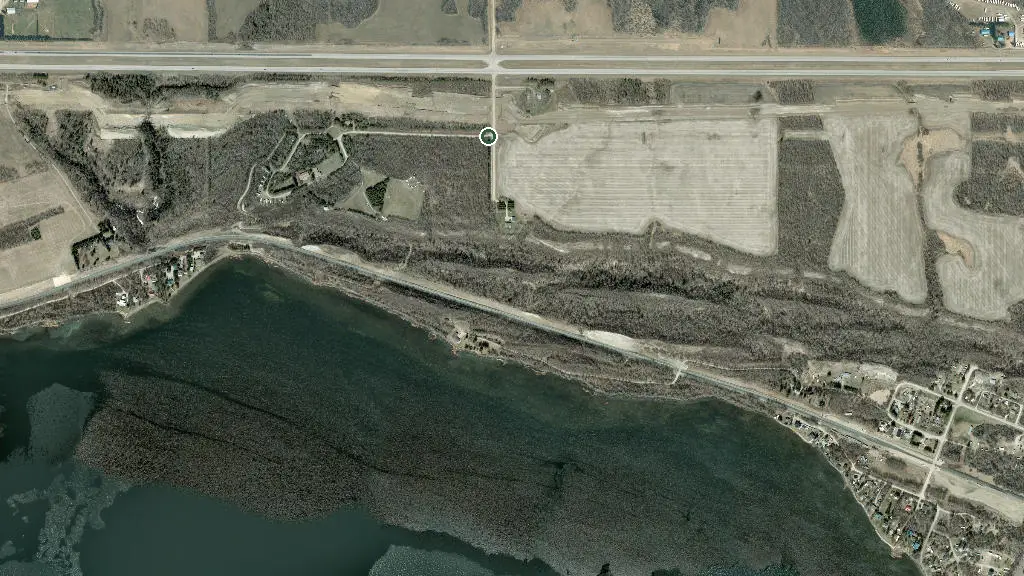 Aerial view of Solara at Water's Edge Waterfront RV Resort, Lake Wabamun and surroundings