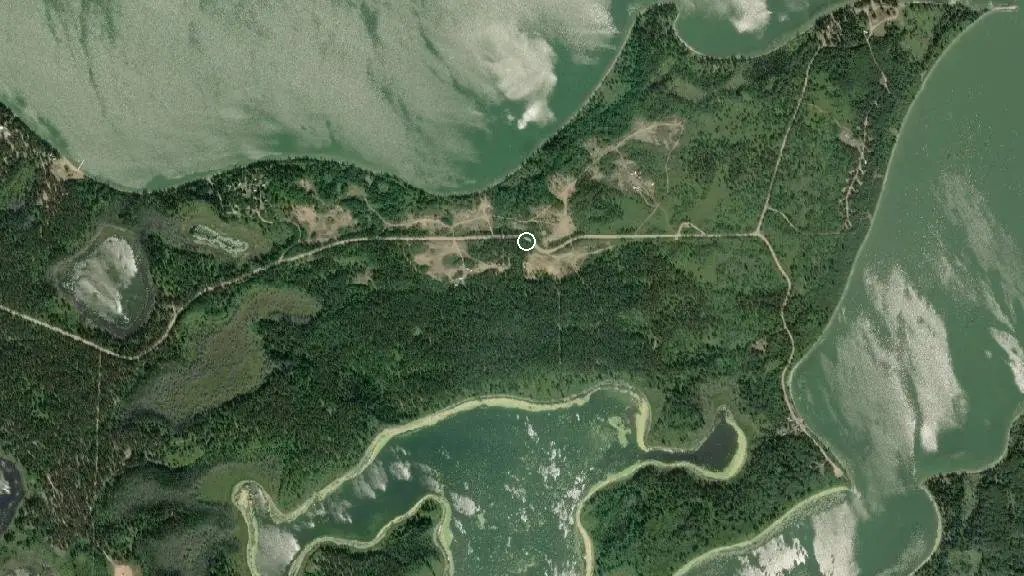 Aerial view of Pelican Point on Moose Lake M.D. Park and surroundings
