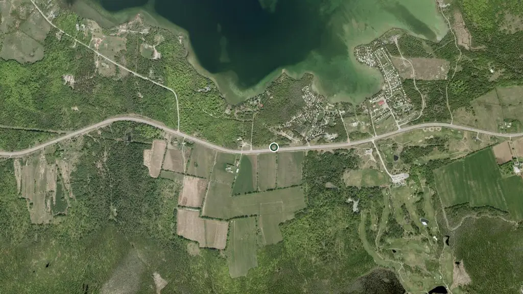 Aerial view of Serenity Bay Cottage & RV Park and surroundings