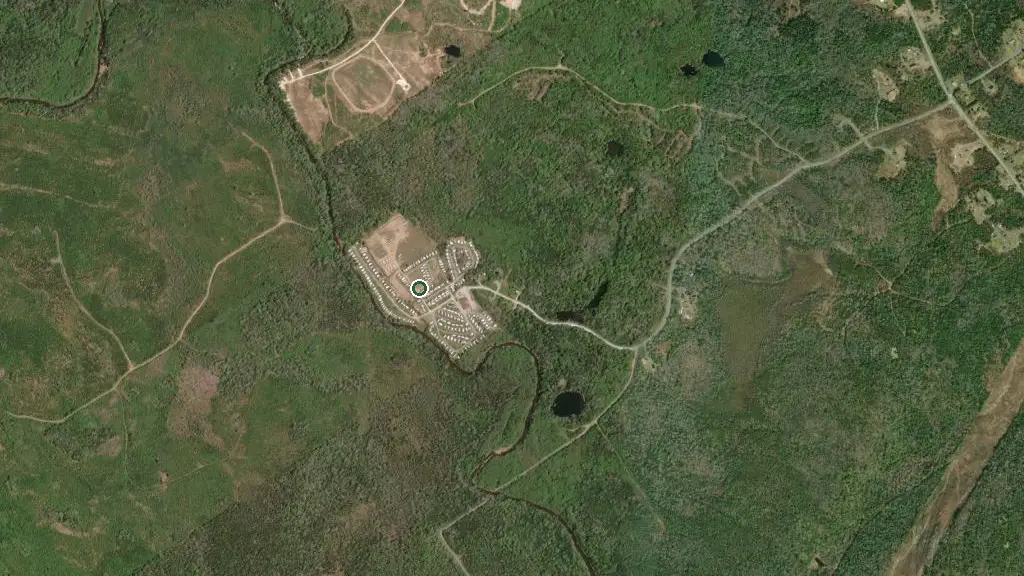Aerial view of Riverland Campground and R.V. Park and surroundings
