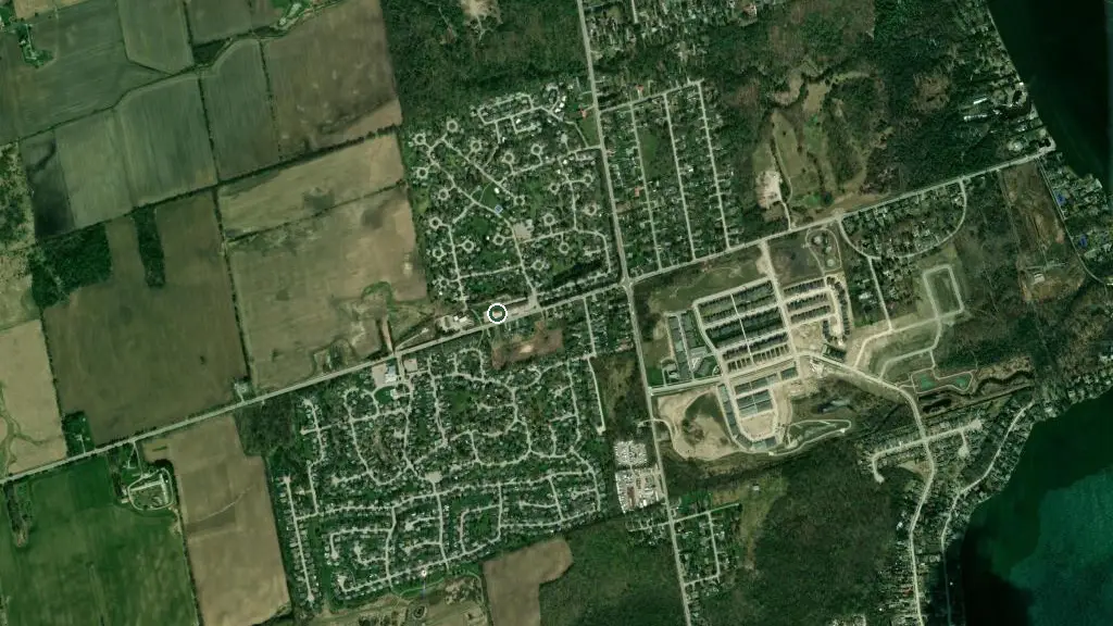 Aerial view of Sandy Cove Campground & Trailer Park and surroundings