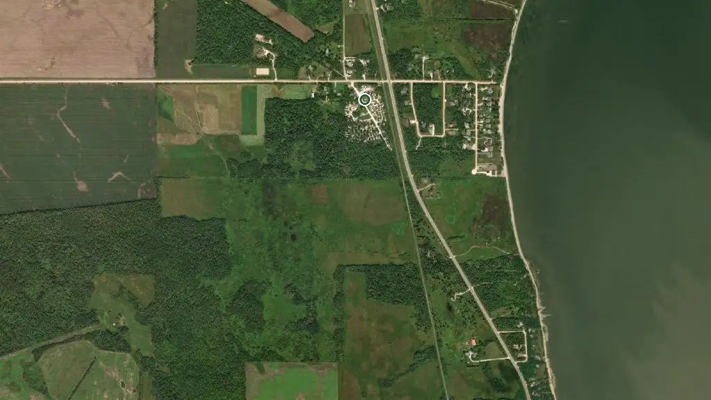 Aerial view of Idle Wheels RV Park and surroundings