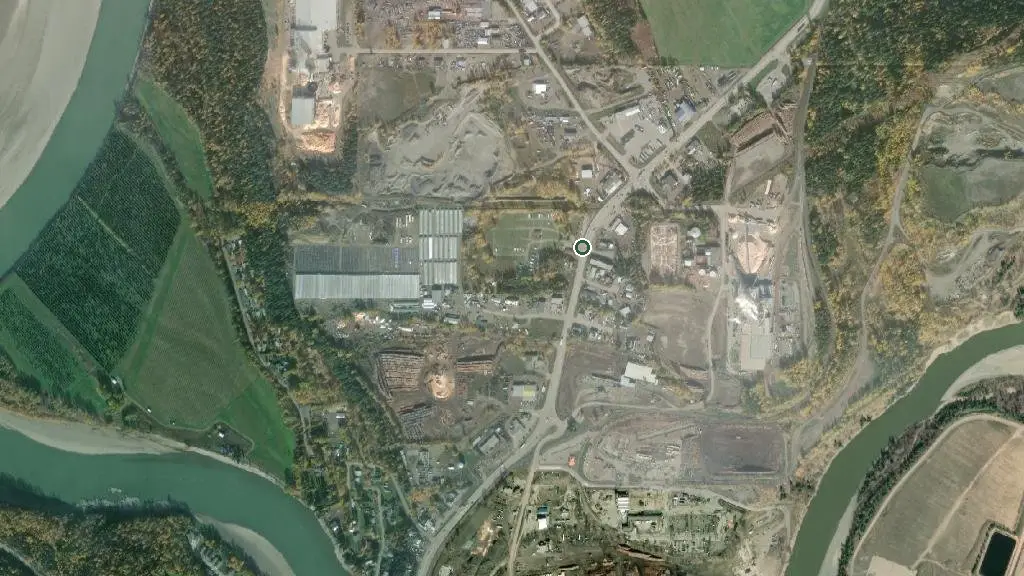Aerial view of Airport Inn Motel & RV Park and surroundings