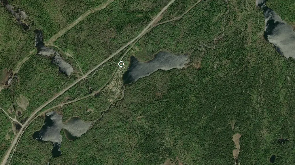 Aerial view of Happy Holiday Campground and Cottages and surroundings