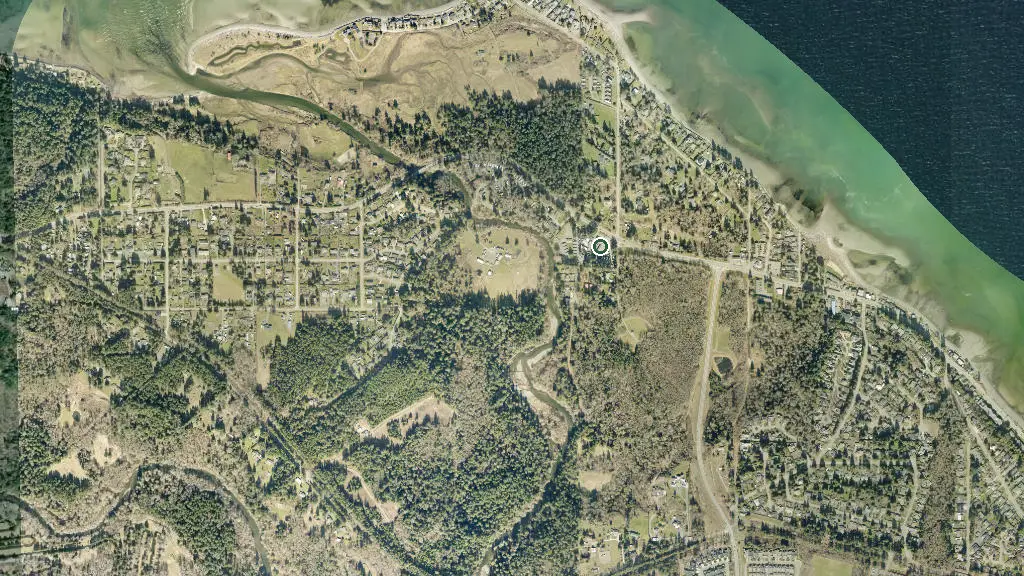 Aerial view of Riverside Resort Motel and Campground and surroundings