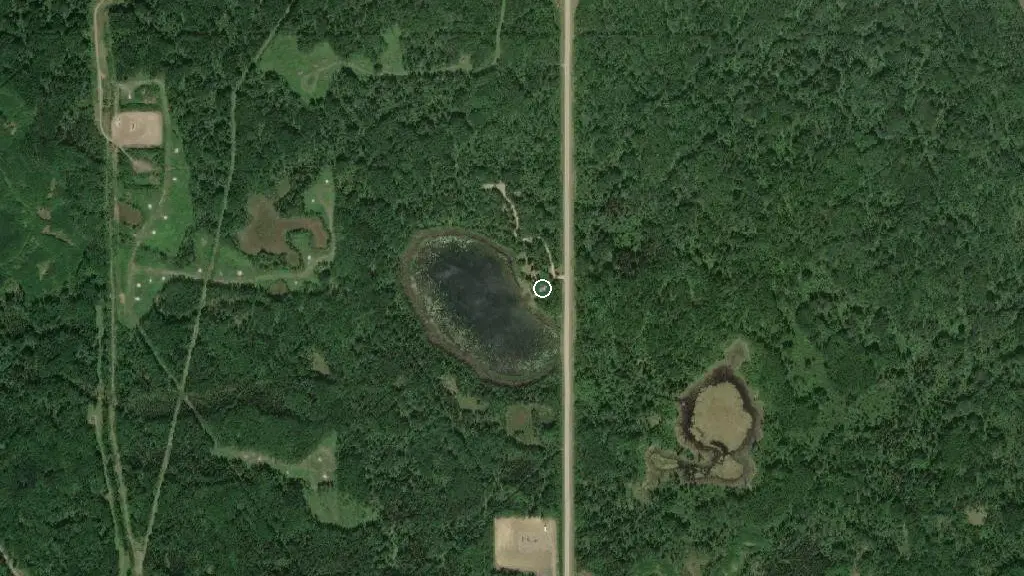 Aerial view of Hilltop Lake Campground and surroundings