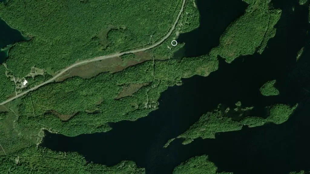 Aerial view of Sharbot Lake - The Point Campground and surroundings
