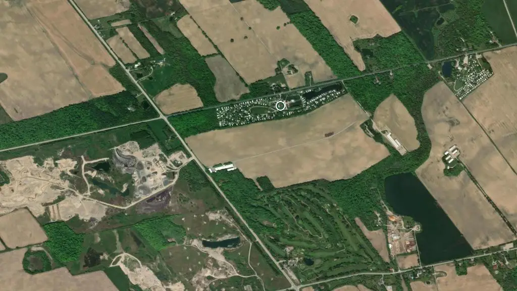 Aerial view of Country Gardens RV Park and surroundings