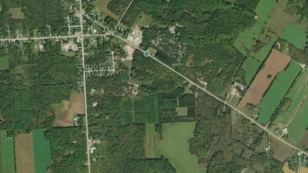 Aerial view of Whispering Pines Family Campground and surroundings