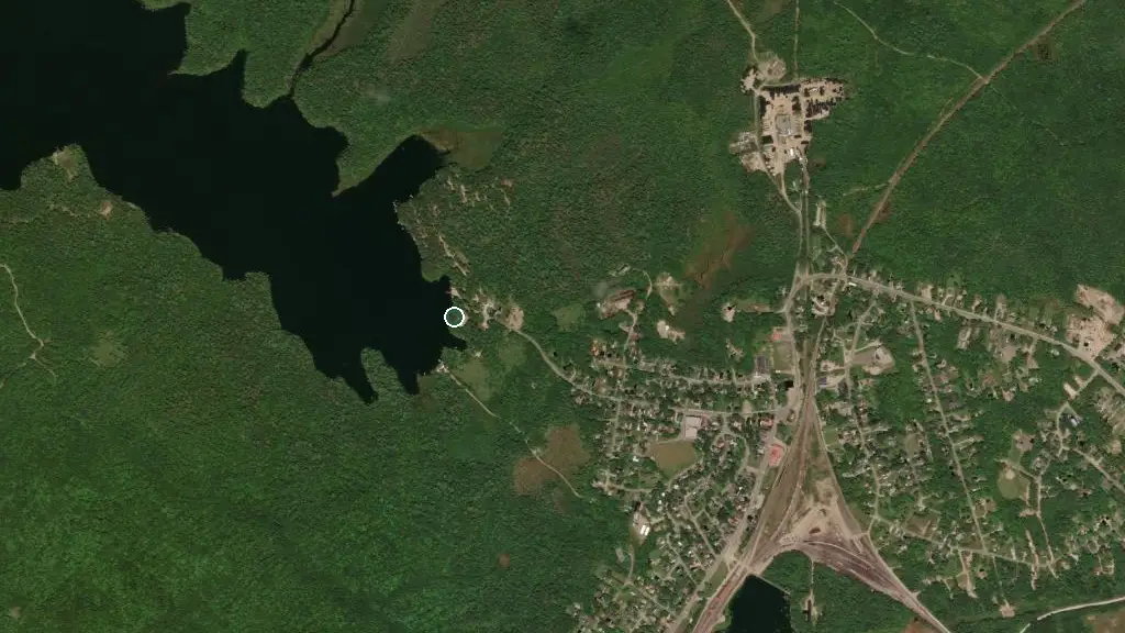Aerial view of Mcadam (Wauklehegan) Lake Campground and surroundings