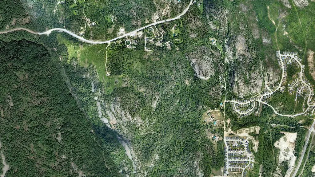 Aerial view of Castlegar Cabins RV Park & Campground and surroundings