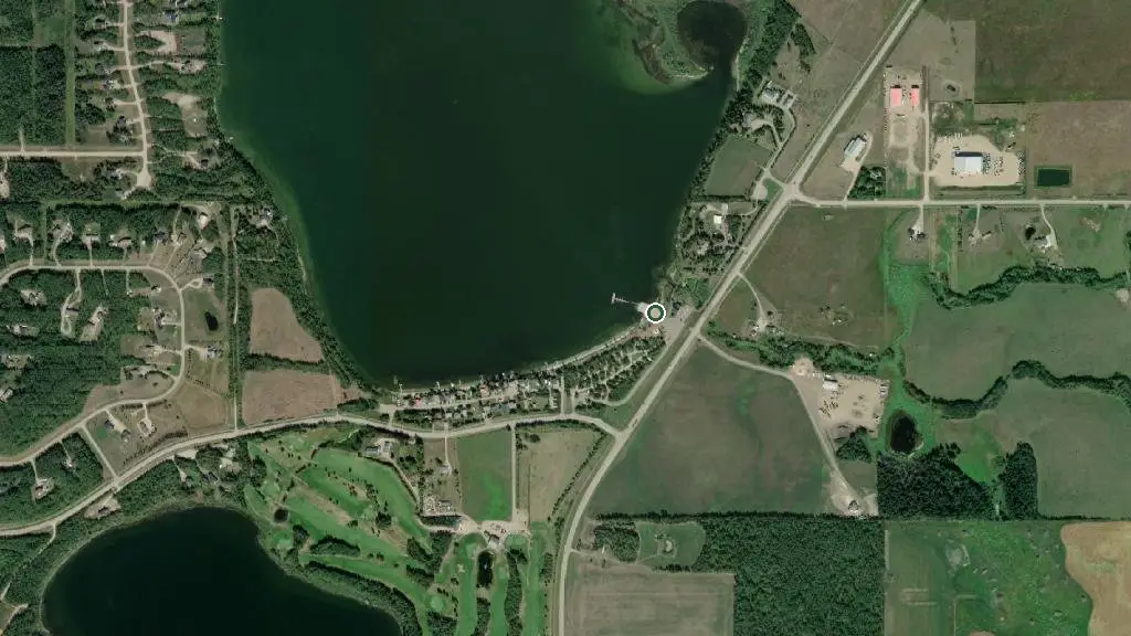 Aerial view of Vezeau Beach on Moose Lake M.D. Park and surroundings
