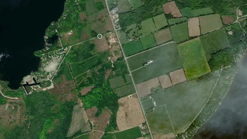 Aerial view of Sandy Beach Resort & Trailer Court and surroundings