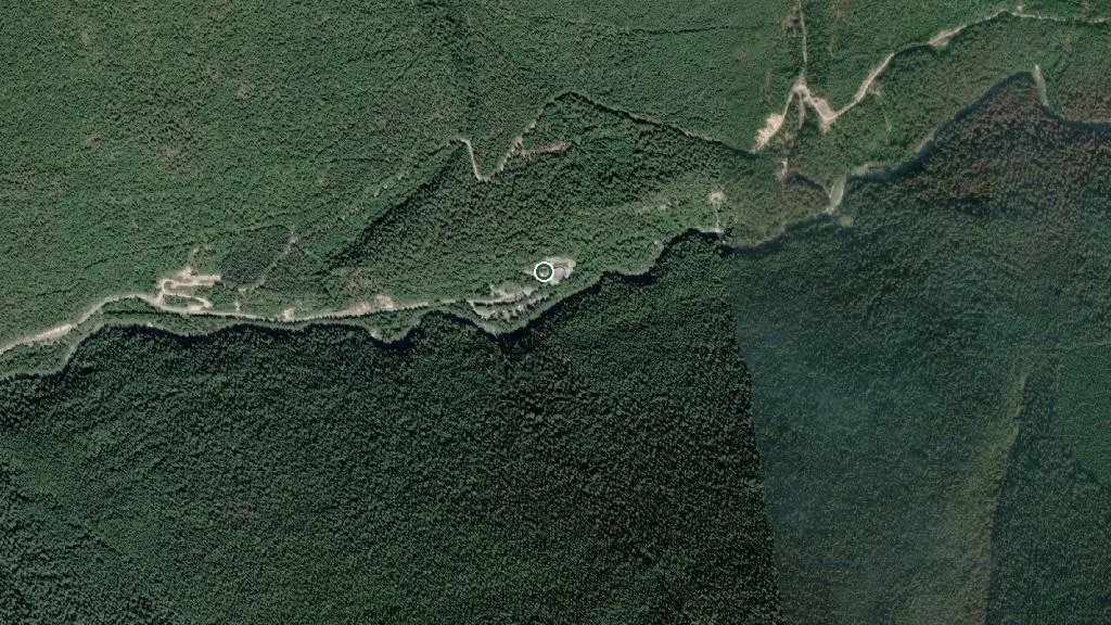 Aerial view of Nakusp Hot Springs, Chalets & Campground and surroundings