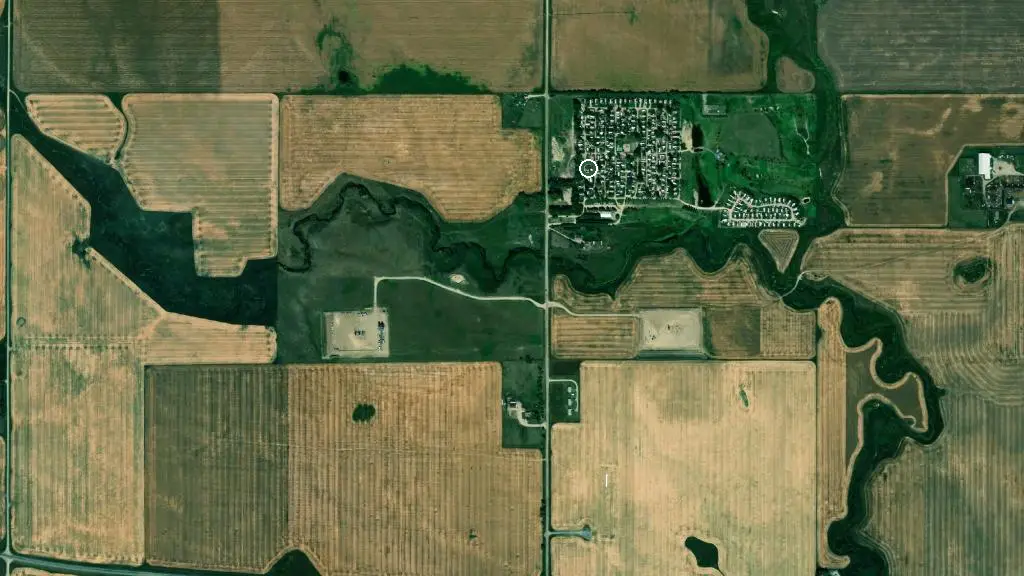 Aerial view of Oasis Grove Golf & RV Park and surroundings