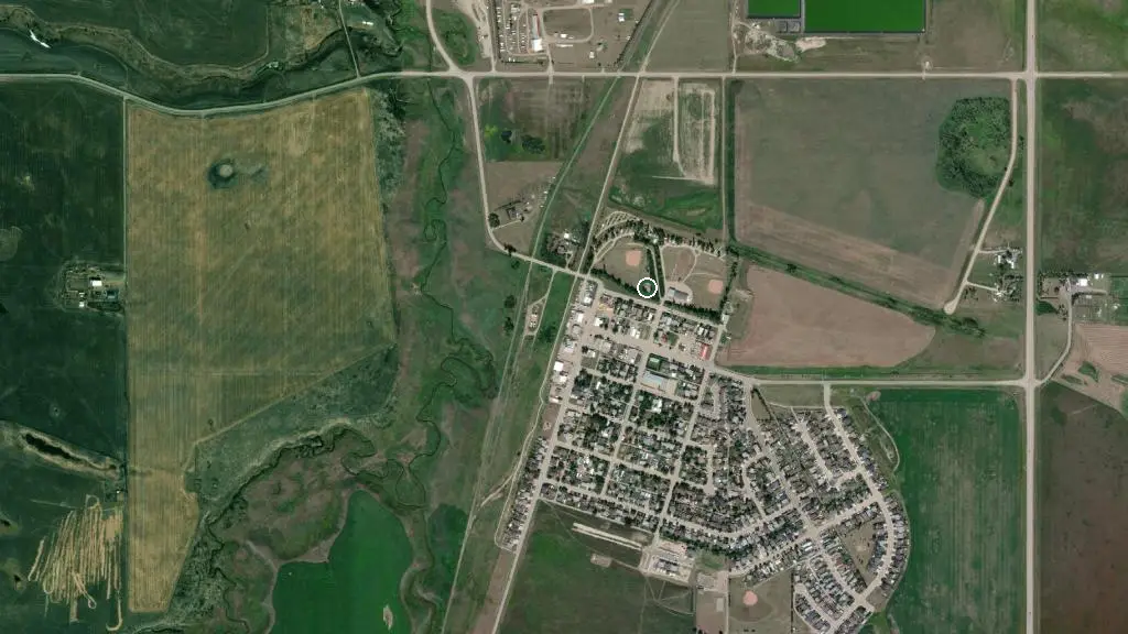 Aerial view of Irricana Municipal Campground (Founders Park) and surroundings
