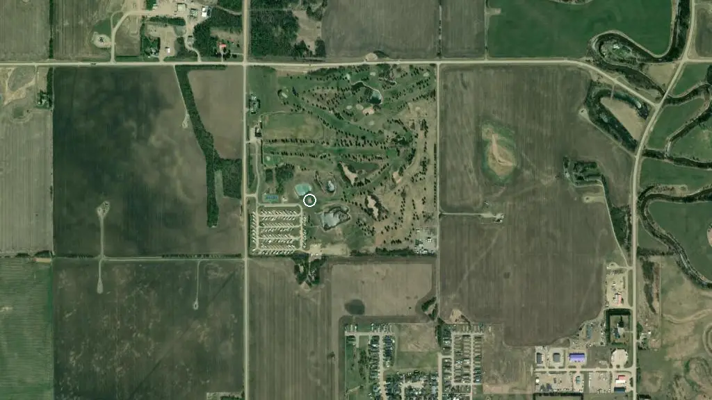 Aerial view of Alberta Views Golf & RV Resort and surroundings