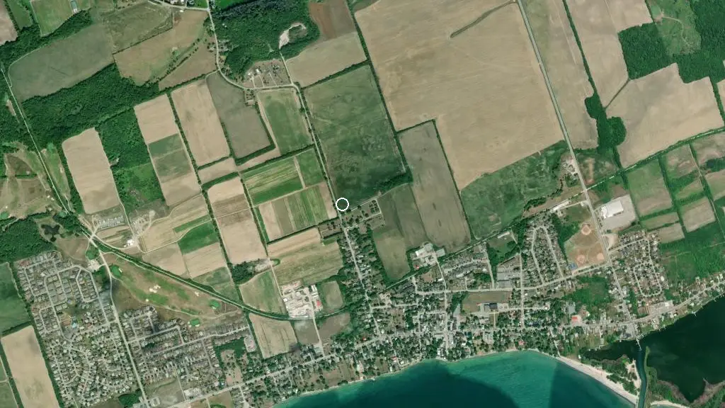 Aerial view of Bay Meadows Trailer Park and surroundings