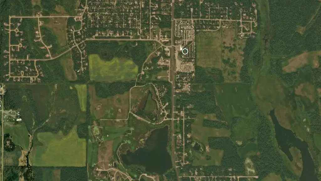 Aerial view of Sportsman's RV Park and surroundings
