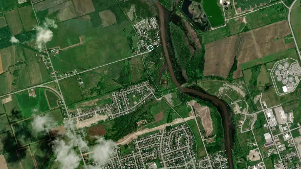 Aerial view of Cedar Valley Trailer Park and surroundings