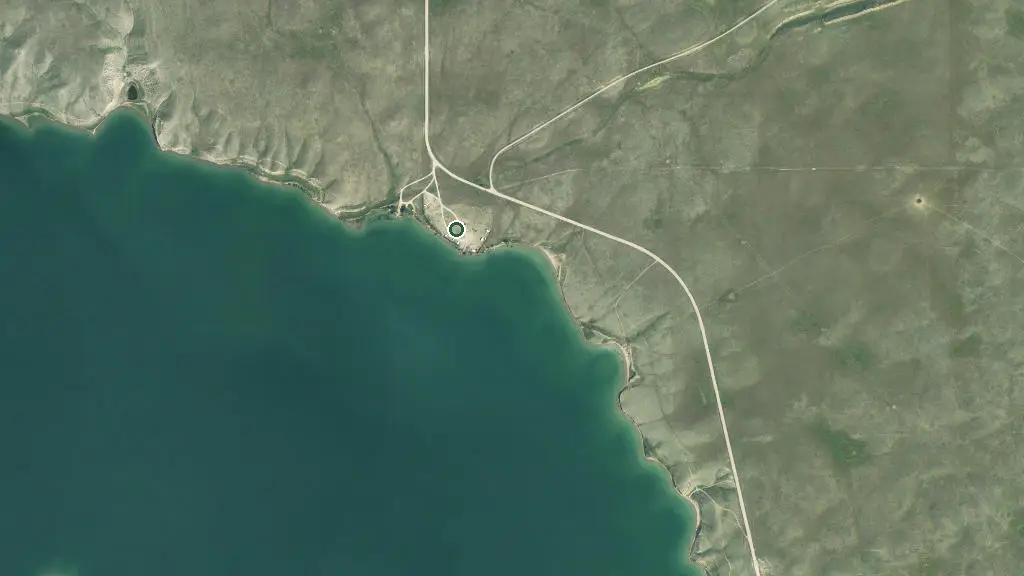 Aerial view of Travers Dam Campground, Travers Reservoir Provincial Recreation Area and surroundings