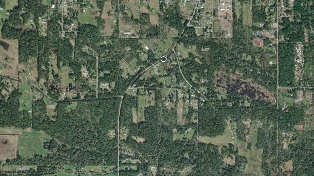 Aerial view of Tranquility Woods Cabins & Campground and surroundings