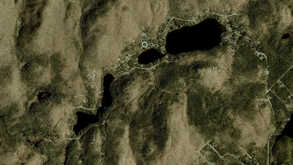 Aerial view of Camping du Domaine du Lac Paré and surroundings