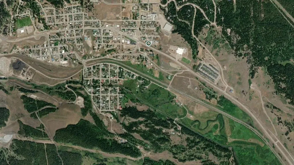 Aerial view of Crowsnest River RV Park and surroundings