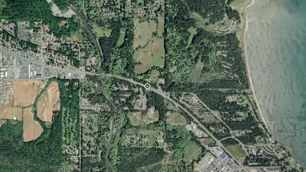 Aerial view of Riverbend Cottage & RV Resort and surroundings