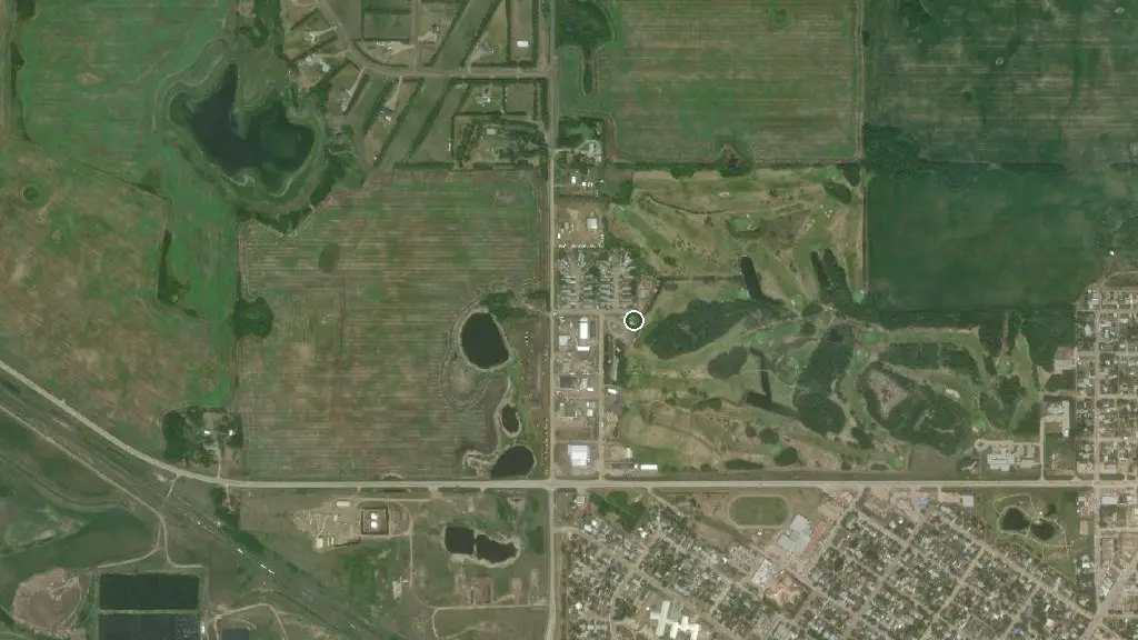 Aerial view of Wainwright Golf Club RV Park and surroundings